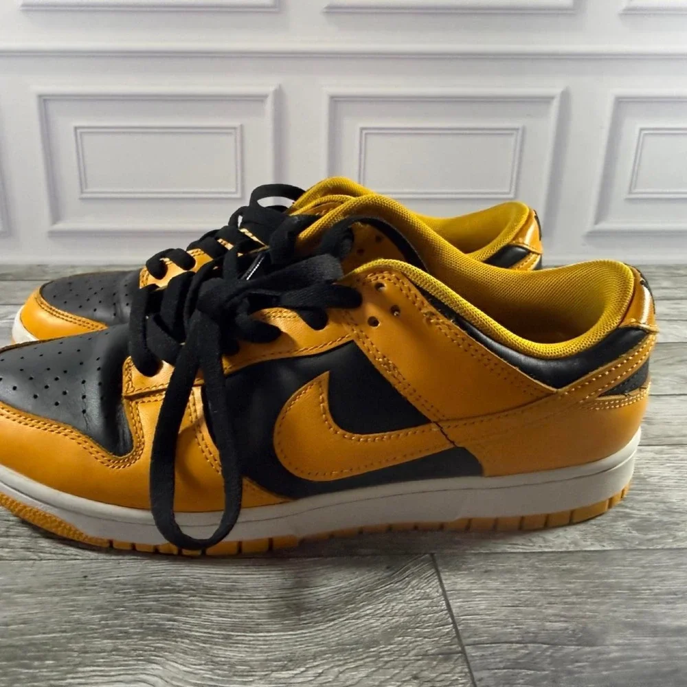 Nike Dunk Low 'Goldenrod' sneakers in yellow/black